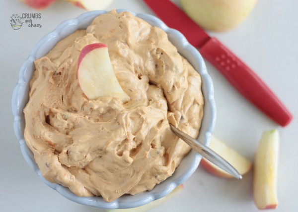 Candy Bar Apple Dip | Crumbs and Chaos #dip #apples #candybar This easy 4 ingredient dip is light and fluffy and perfect for this season's apples! www.crumbsandchaos.dreamhosters.com