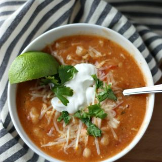 You'll love this simple chili any night of the week! Taco Ranch Chicken Chili can be made in as little as 30 minutes or cook it in the slow cooker.
